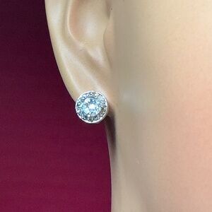 Sterling Silver Round Stud Earrings with clear stones.